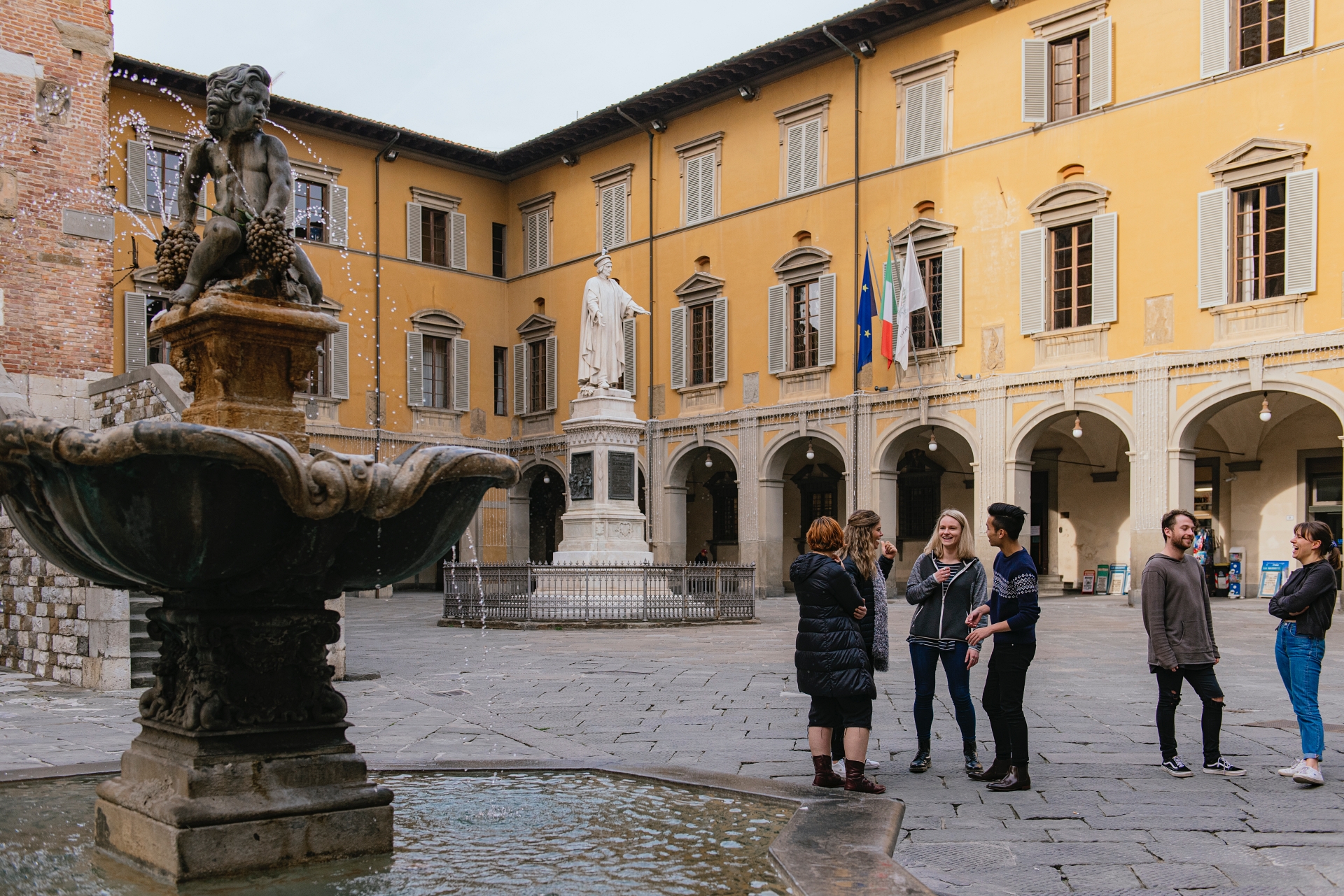 Student talking Piazza del Comune