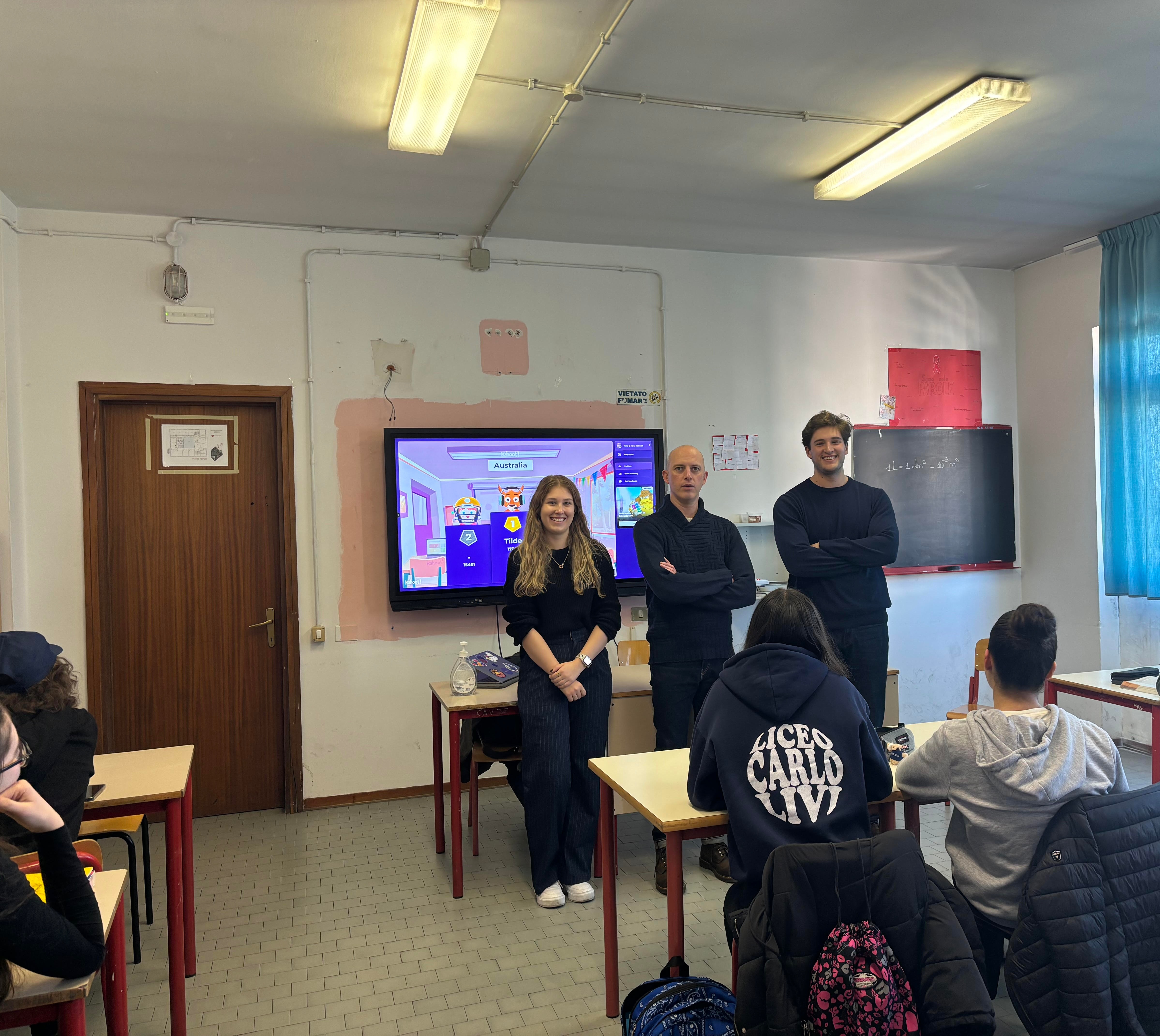 Monash pre-service teachers Hugo and Skylah in class with their mentor and students at Liceo Carlo Livi in Prato